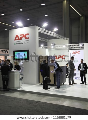 MILAN, ITALY - OCTOBER 17: People visit APC technologies products area at SMAU, international fair of business intelligence and information technology October 17, 2012 in Milan, Italy.