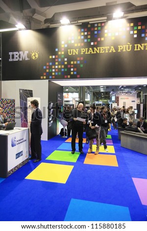 MILAN, ITALY - OCTOBER 17: People at IBM technologies products area at SMAU, international fair of business intelligence and information technology October 17, 2012 in Milan, Italy.
