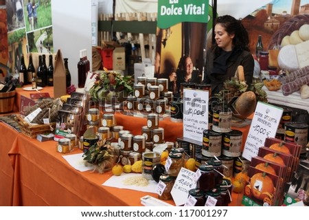 TORINO, ITALY - OCTOBER 24: People sell local food at Salone del Gusto, international fair of tastes and slow food on October 24, 2010 in Torino, Italy.