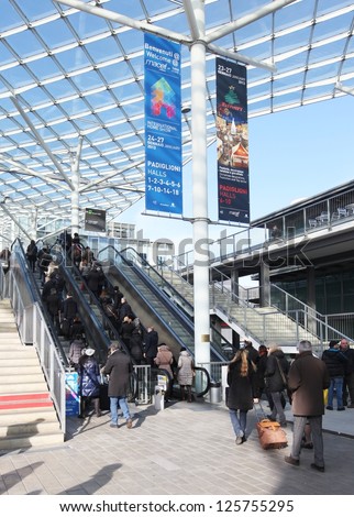 MILAN, ITALY - JANUARY 24: People enter home interior design exposition at Macef, International Home Show Exhibition on January, 24 2013 in Milan, Italy.