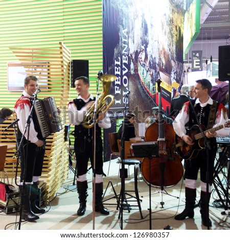 MILAN, ITALY - FEB 16: Musicians playing at Slovenia exhibition area at BIT, International Tourism Exchange Exhibition on February 16, 2012 in Milan, Italy.