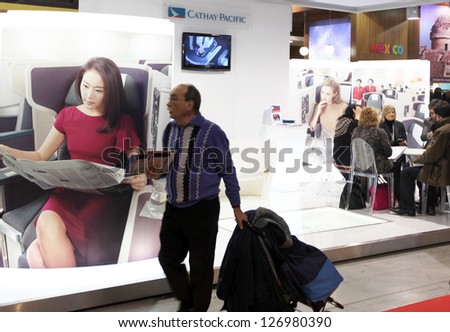 MILAN, ITALY - FEB 16: People visit tourism exhibition area at BIT, International Tourism Exchange Exhibition on February 16, 2012 in Milan, Italy.