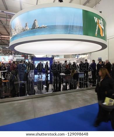 MILAN, ITALY - FEBRUARY 15: People crowd visiting tourism exhibition area at BIT, International Tourism Exchange Exhibition on February 15, 2013 in Milan, Italy.