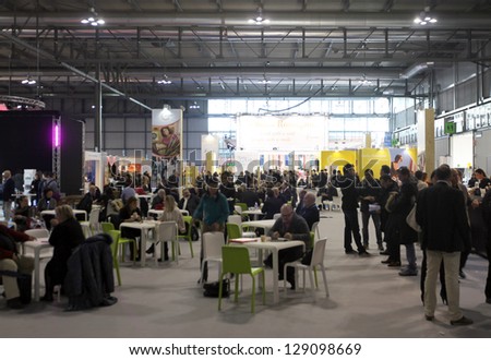MILAN, ITALY - FEBRUARY 15: People visiting tourism exhibition area at BIT, International Tourism Exchange Exhibition on February 15, 2013 in Milan, Italy.