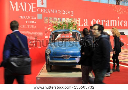 MILAN - APRIL 10: People enter Salone del Mobile, international home furnishing design and accessories exhibition on April 10, 2013 in Milan, Italy.