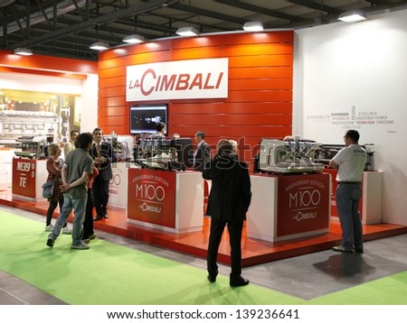 MILAN, ITALY - MAY 20: People at LaCimbali exhibition stands at Tuttofood, Milano World Food Exhibition May 20, 2013 in Milan, Italy.