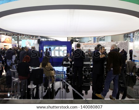MILAN, ITALY - FEBRUARY 15: People crowd visit tourism exhibition area at BIT, International Tourism Exchange Exhibition on February 15, 2013 in Milan, Italy.