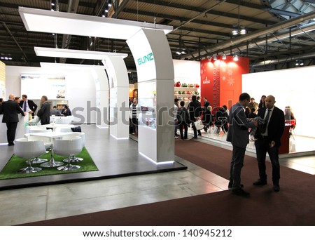 MILAN, ITALY - MAY 20: People visit food productions exhibition stands at Tuttofood, Milano World Food Exhibition May 20, 2013 in Milan, Italy.