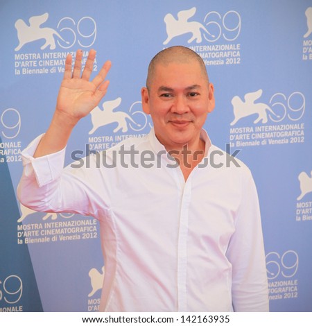 VENICE - SEPTEMBER 8: Tsai Ming Liang poses for photographers at 69th Venice Film Festival on September 8, 2012 in Venice, Italy.