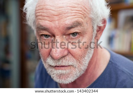 Portrait of a caucasian man, neutral expression.