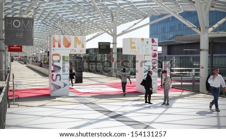 MILAN, ITALY - SEPTEMBER 13: People enter home architecture and interior design exposition at Macef, International Home Show Exhibition on September, 13 2013 in Milan, Italy.
