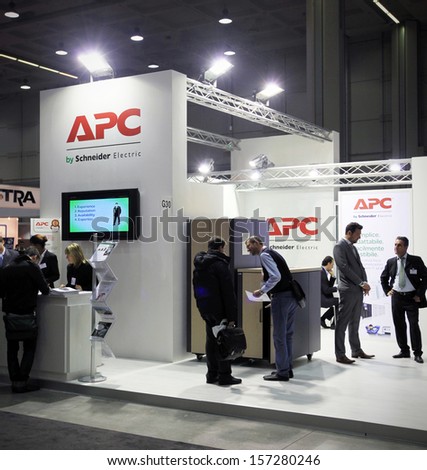 MILAN, ITALY - OCTOBER 17: People visit APC  technology products exhibition area at SMAU, international fair of business intelligence and information technology October 17, 2012 in Milan, Italy.