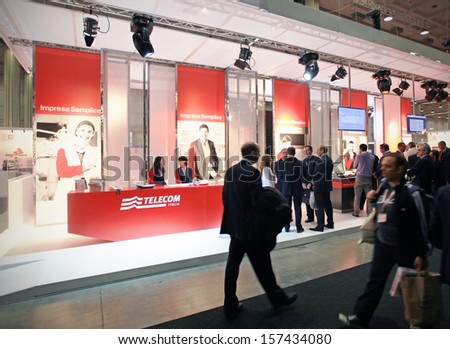MILAN, ITALY - OCTOBER 19: People at Telecom technologies stand during SMAU, international fair of business intelligence and information technology October 19, 2011 in Milan, Italy.