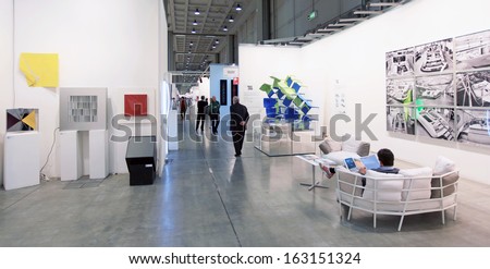 Milan, Italy - April 08: Walking Trough Paintings Galleries During Miart, International Exhibition Of Modern And Contemporary Art On April 08, 2011 In Milan, Italy