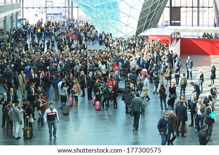 Milano, Italy - April 10, 2013: People Crowd Enter Salone Del Mobile, International Furnishing Accessories Exhibition At Rho Fiera Center In Milano, Italy.