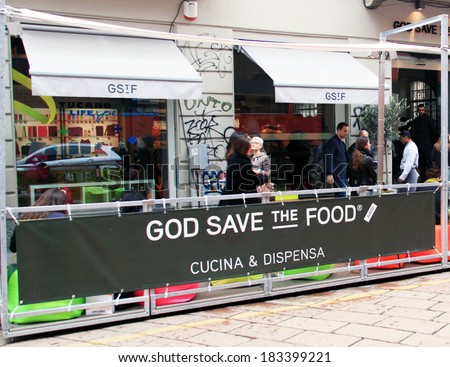 MILANO, ITALY - APRIL 12, 2013: God Save the Food corner on the street at Fuorisalone Milano Design week public exhibition on the streets of Navigli area in Milano, Italy.