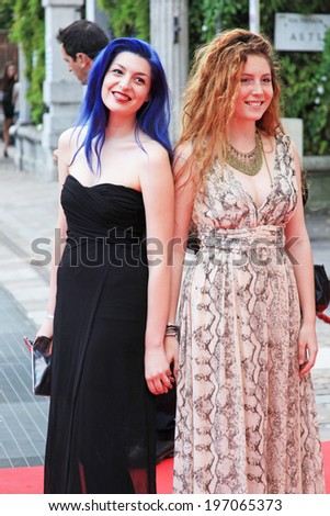 MILANO, ITALY - MAY 26, 2014: Two women with colored hair on the Red Carpet at International Grand Prix Advertising Strategies in Milano Italy.