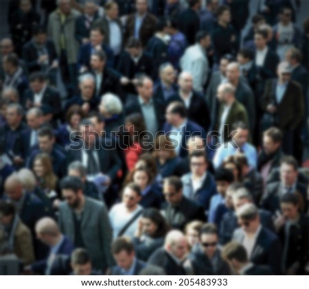 People crowd, intentionally blurred background