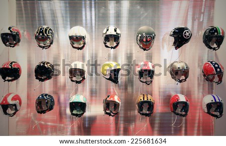 MILAN, ITALY - NOVEMBER 03, 2010: Motorcycles helmets in exhibition at EICMA, 68th International Motorcycle Exhibition in Milano, Italy.