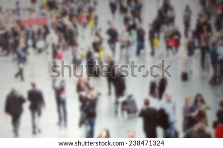 People crowd background, intentionally blurred post production.