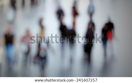 People silhouettes background. Intentionally blurred post production.