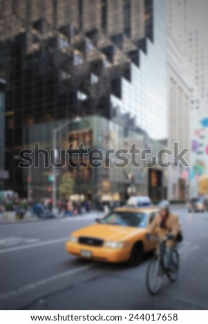 Taxi and bike in new York City. Intentionally blurred post production.