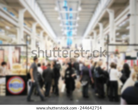 Trade show people. Intentionally blurred post production.