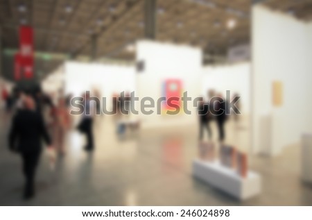 Art gallery generic background. Intentionally blurred post production, people and location not recognizable.
