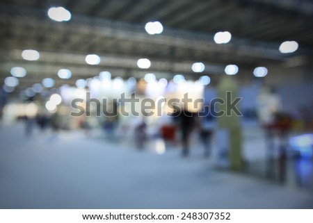Interiors lights, generic trade show background. Intentionally blurred post production.