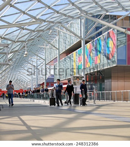 MILANO, ITALY - APRIL 10, 2014: People at the entrance of Salone del Mobile, international home furnishing and accessories design exhibition in Milano, Italy.