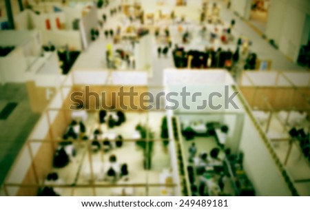 Trade show interiors background. Intentionally blurred post production background.