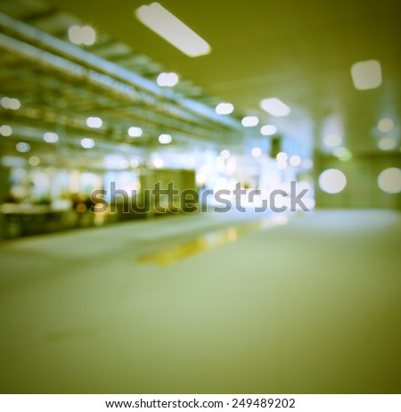 Trade show interiors lights background. Intentionally blurred post production background.