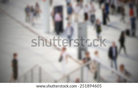 People crowd background. Intentionally blurred editing post production. Humans not recognizable.