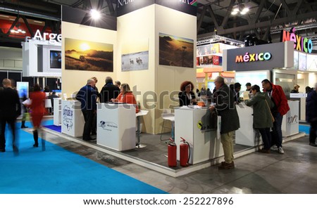 MILANO, ITALY - FEBRUARY 12, 2015: People visit tourism exhibition stands area at BIT, International Tourism Exchange Exhibition in Milano, Italy.