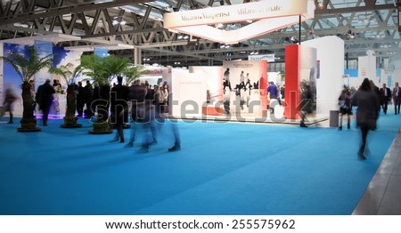 MILANO, ITALY - FEBRUARY 12, 2015: People visit tourism exhibition stands area at BIT, International Tourism Exchange Exhibition in Milano, Italy.