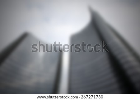 Modern skyscrapers generic background. Intentionally blurred editing post production.