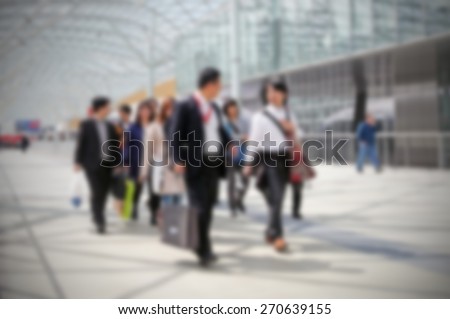 Business men group, generic background. Intentionally blurred editing post production.