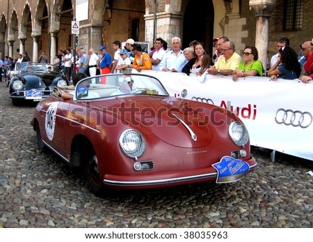 MANTUA, ITALY - SEPT. 18: A 1955 Porsche 356 AS parades at a veteran cars event Gran Premio Nuvolari in honor of famous Italian car champion Tazio Nuvolari September 18, 2009 in Mantua, Italy.