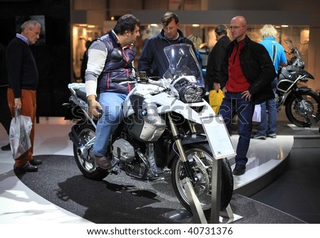 MILAN, ITALY - NOV. 11: People art BMW stand at EICMA, 67th International Motorcycle Exhibition November 11, 2009 in Milan, Italy.