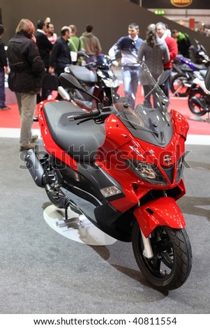 MILAN, ITALY - NOV. 11: Red scooter motorcycle at EICMA, 67th International Motorcycle Exhibition November 11, 2009 in Milan, Italy.