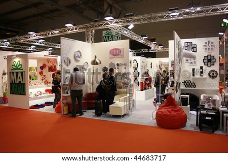 MILAN, ITALY - JANUARY 15: People walk through home furnishings at Macef, International Home Show Exhibition January 15, 2010 in Milan, Italy.