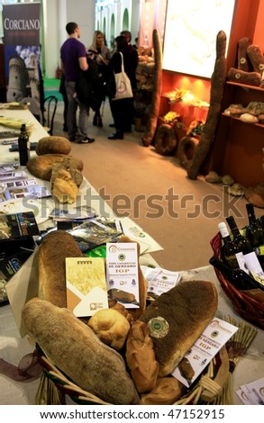 MILAN, ITALY - FEBRUARY 20: People participates to exhibition of hand made bread from Genzano at BIT, International Tourism Exchange Exhibition February 20, 2010 in Milan, Italy.