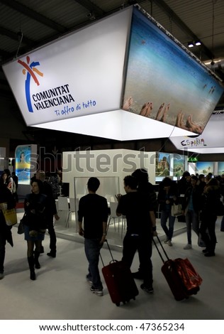 MILAN, ITALY - FEBRUARY 20: People trough stands at BIT, International Tourism Exchange Exhibition February 20, 2010 in Milan, Italy.