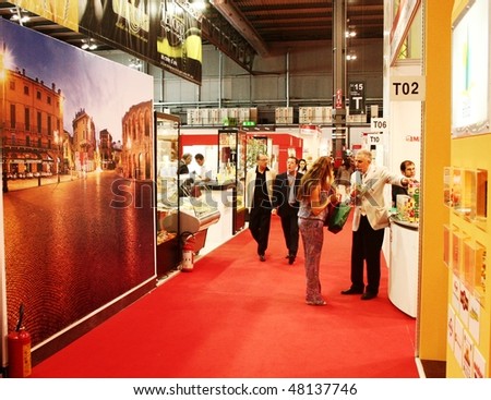 MILAN, ITALY - JUNE 10: People wak trough local productions made in Italy at Tuttofood 2009, World Food Exhibition June 10, 2009 in Milan, Italy.