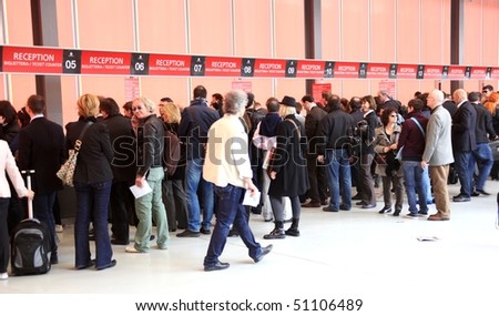 MILAN - APRIL 15: Crowd looking for ticket to enter Salone del Mobile, international furnishing accessories exhibition April 15, 2010 in Milan, Italy.