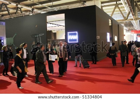 MILAN - APRIL 15: People at stands at Salone del Mobile, international furnishing accessories exhibition April 15, 2010 in Milan, Italy.