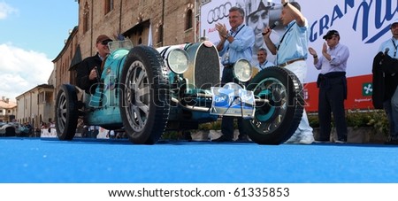 MANTUA, ITALY - SEPTEMBER 19: A 1935 Bugatti Type 35 parades at a veteran cars event Gran Premio Nuvolari in honor of famous Italian car champion Tazio Nuvolari September 19, 2010 in Mantua, Italy.