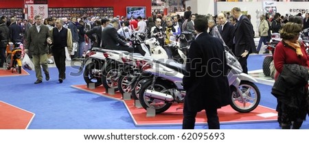 MILAN, ITALY - NOV. 11: Crowd visiting stands at EICMA, 67th International Motorcycle Exhibition November 11, 2009 in Milan, Italy.