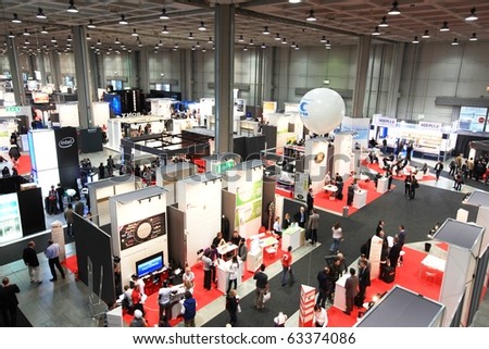 MILAN, ITALY - OCT. 20: Panoramic view of people visiting stands at SMAU, international fair of business intelligence and information technology October 20, 2010 in Milan, Italy.