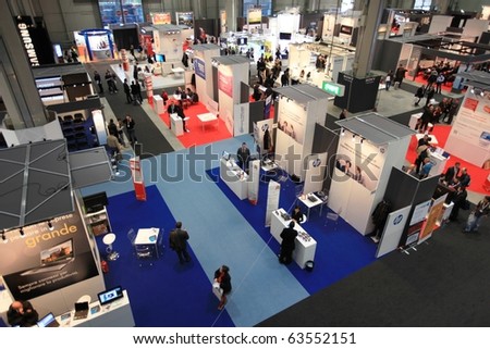 MILAN, ITALY - OCT. 20: People visit stands at SMAU, international fair of business intelligence and information technology October 20, 2010 in Milan, Italy.